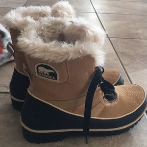 Tan and black sorel boots. Only worn three times